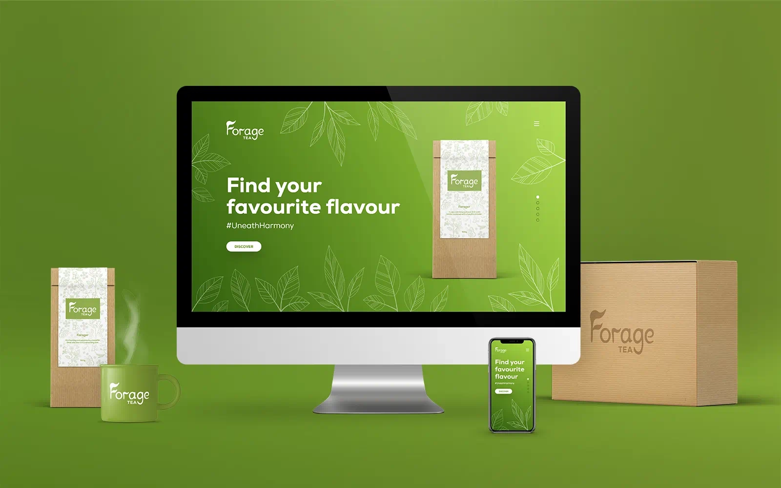 On a plain, green background is a modern computer showing a mockup of the Forage Tea website. Next to the computer are some packaging mockups together with a mockup of what the website would look like on mobile